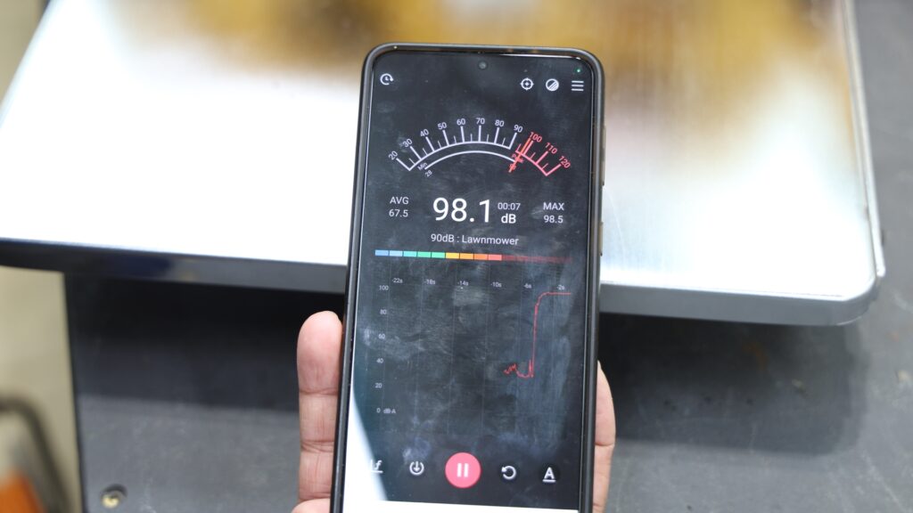 Sound meter showing 98.1 dB while DeWalt 735x planer is running