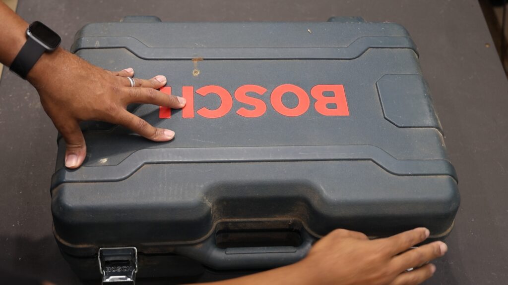 Bosch router kit hard carrying case with red Bosch logo.