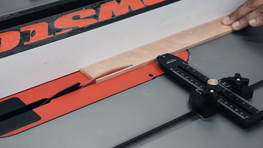 GoingMake thin rip jig in use on table saw cutting narrow wood strip