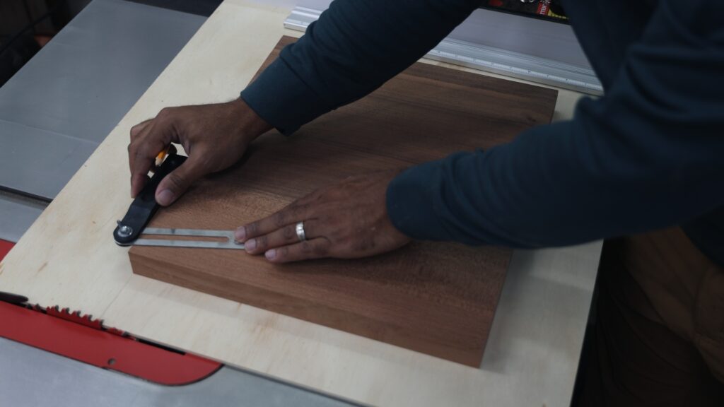 Using T-bevel angle gauge to transfer angle measurement on walnut wood