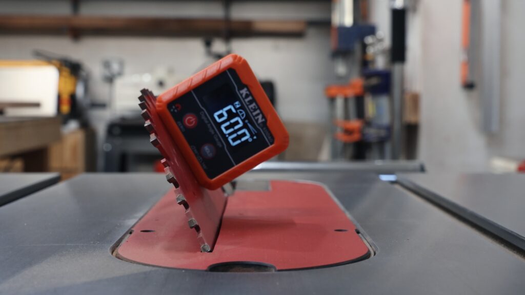 Klein digital level showing angle measurement on table saw blade