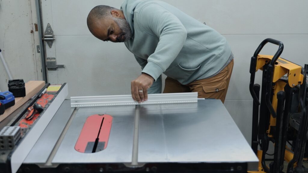 Powertec aluminum straight edge checking flatness on table saw surface