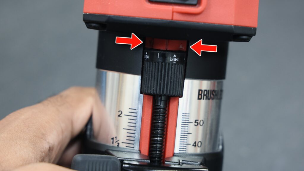 Close-up of micro-adjustment dial with tiny directional arrows
