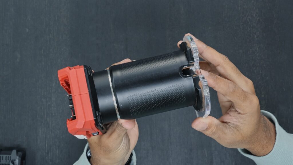 Close-up of the SKIL RT1430B textured metal barrel grip