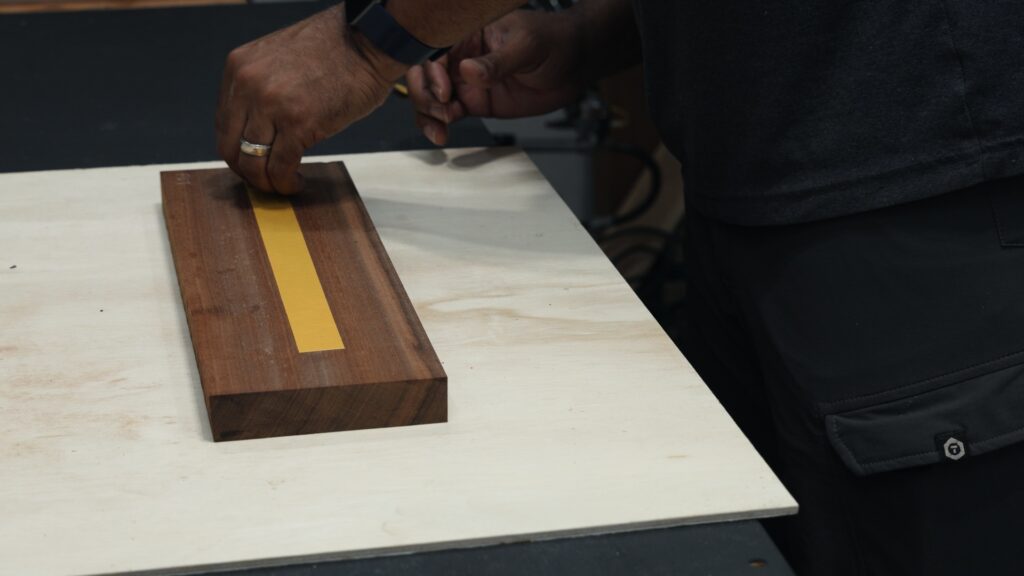 XFasten double sided woodworking tape holding walnut pieces on table saw