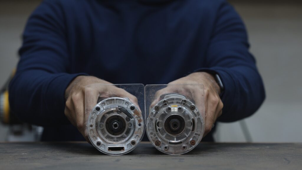 Flex and DeWalt cordless trim routers with similarly sized D-shaped bases