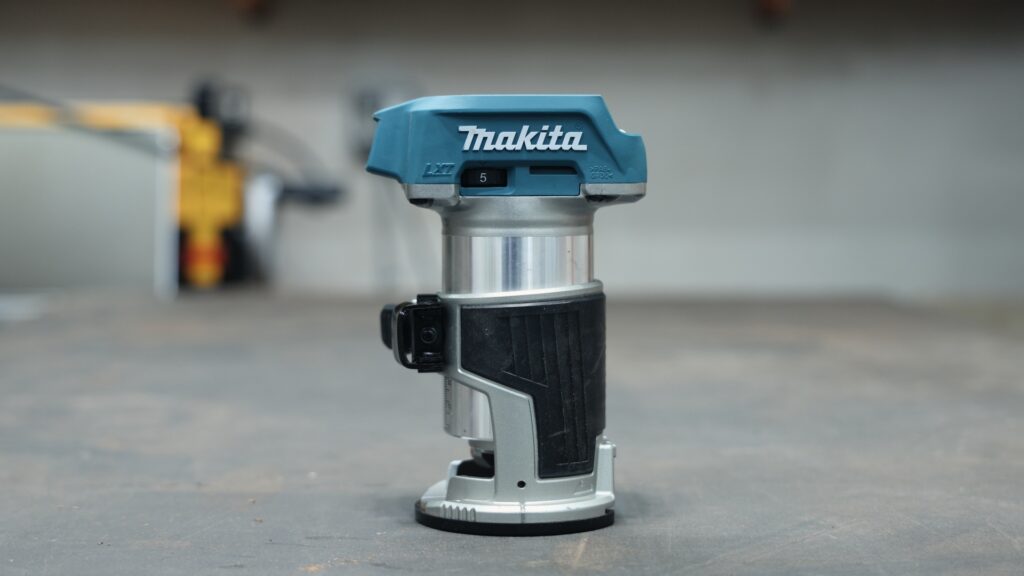 Makita XTR01Z 18V LXT cordless trim router on workbench