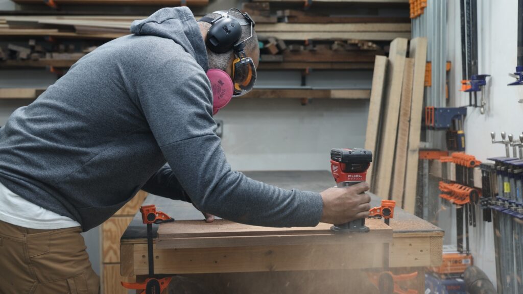Milwaukee 2723-20 cutting a rabbet in hardwood during power testing