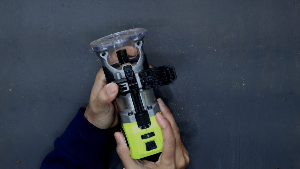 Depth adjustment and latch system on the Ryobi ONE+ HP cordless trim router